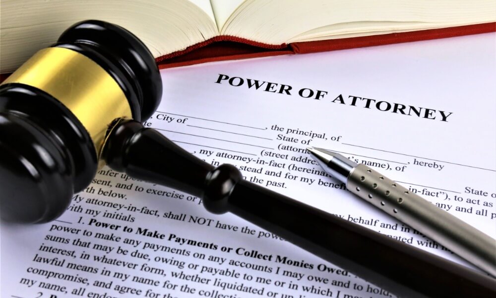 Special Power of Attorney, gavel, and pen